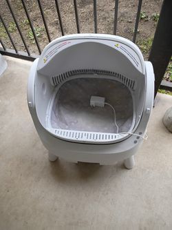 Self cleaning cat litter, box $100