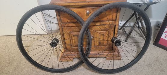 TWO THIN 20" TUBELESS TIRES AND RIMS