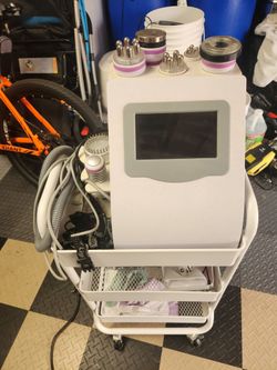 Ultrasonic Cavitation and Radiofrequency (RF) Beauty Machine (often sold online as a 5-in-1 body slimming and skin tightening machine