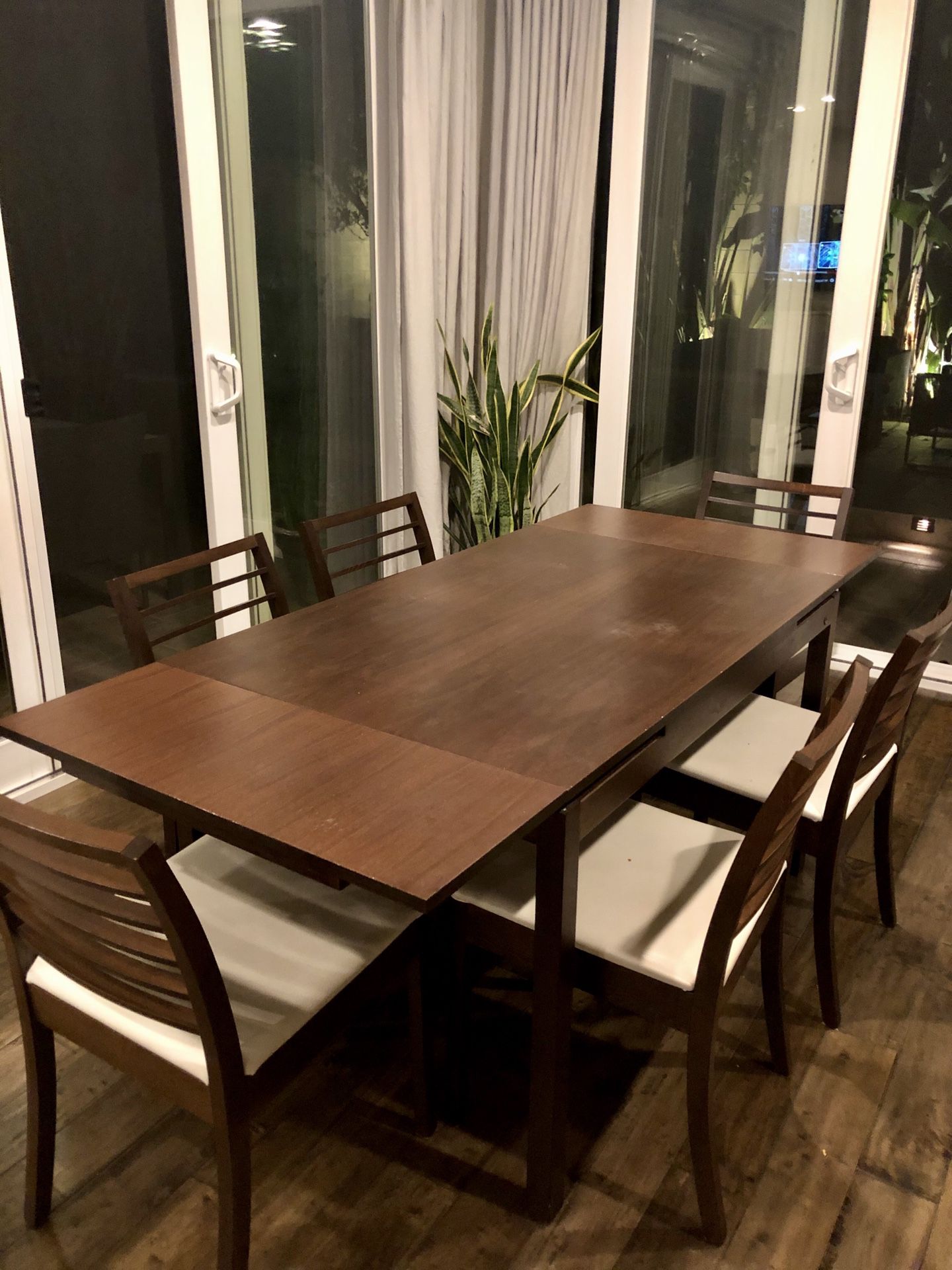 Calligaris (modern Italian brand) dining table and 6 chairs (extendable to 24 “)