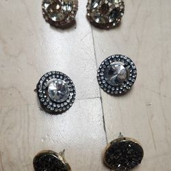 collection of vintage-style costume jewelry earrings,