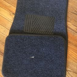 BRAND NEW CAR OR TRUCK MATS 2 FOR THE FRONT AND 2 FOR THE BACK.