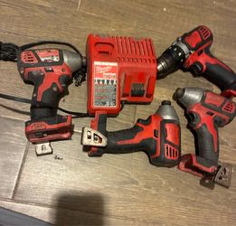 Milwaukee drills and battery charger