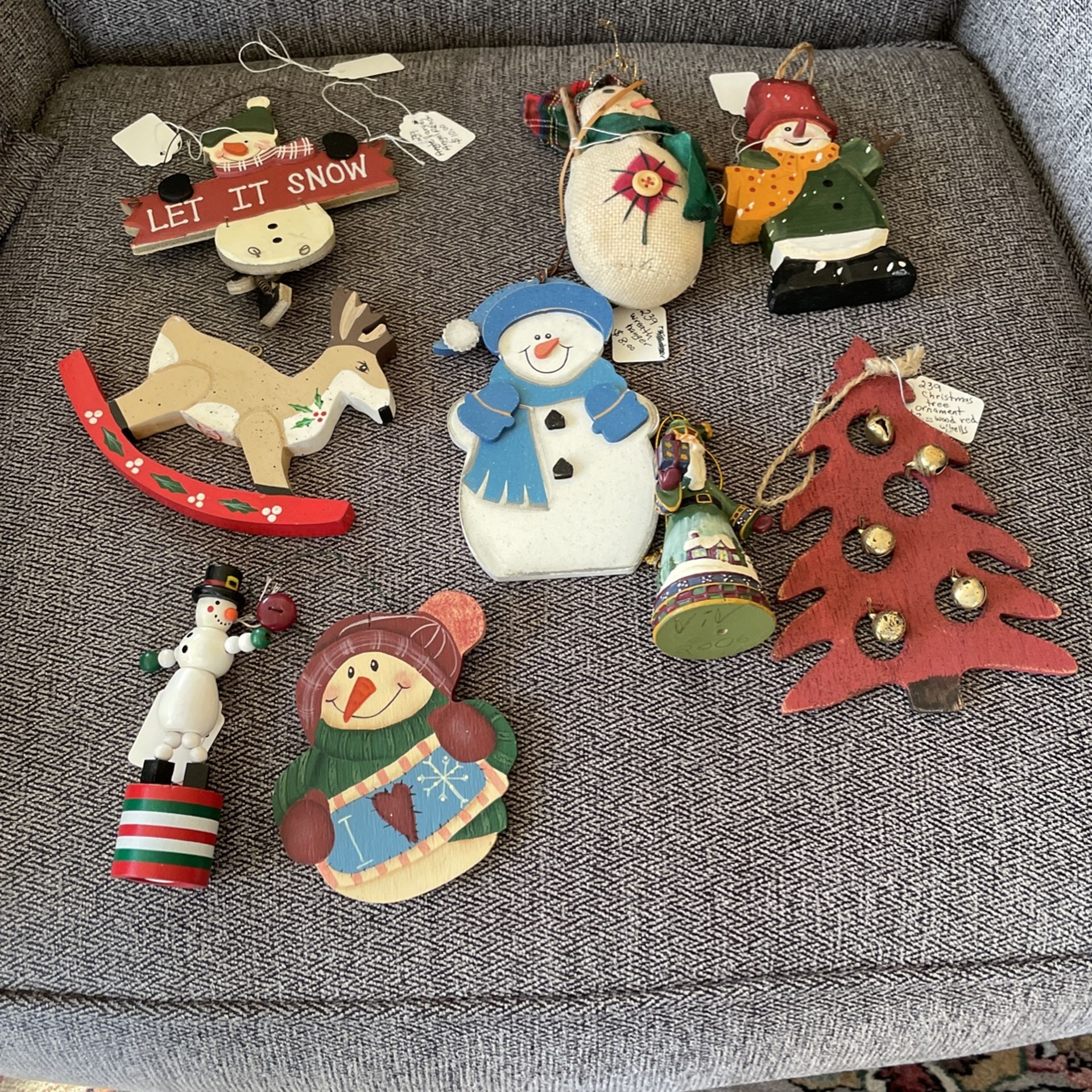 Some are wooden snowman tree decorations, Reindeer wooden ceramic Santa