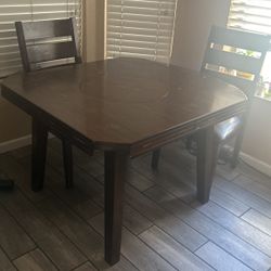 Ashley’s Breakfast Table With 2 Chairs 