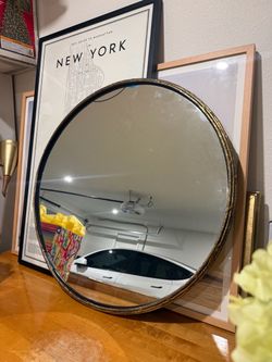 CB2 round metal wall mirror