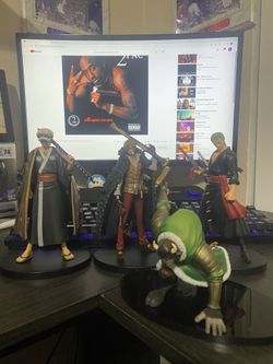 One Piece Figures ( Tra-guy , Sanji , Dalton , Zoro )