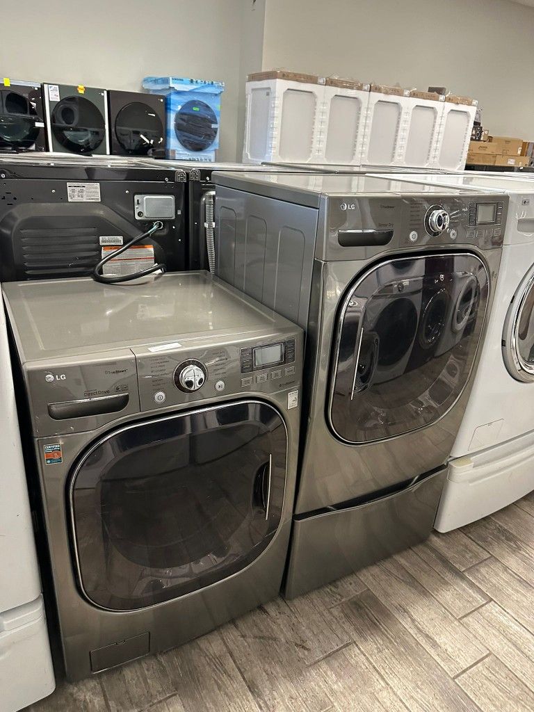 LG washer and dryer set electric mega capacity with one included pedestal