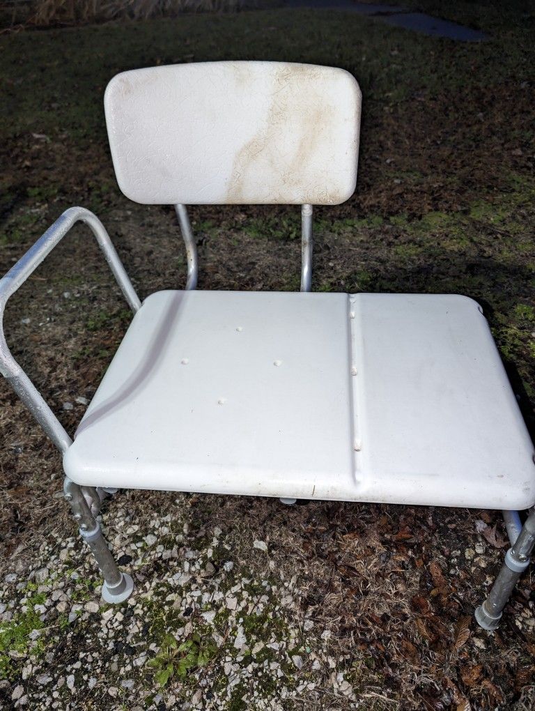 Shower chair bath transfer bench, adjustable too. The left back is a bit discolored, I'm not sure why. Maybe try a bit of bleach. I'm thinking I might