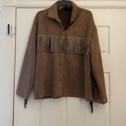Like new adorable and unique light brown fringe jacket. Worn once. Womens size medium 