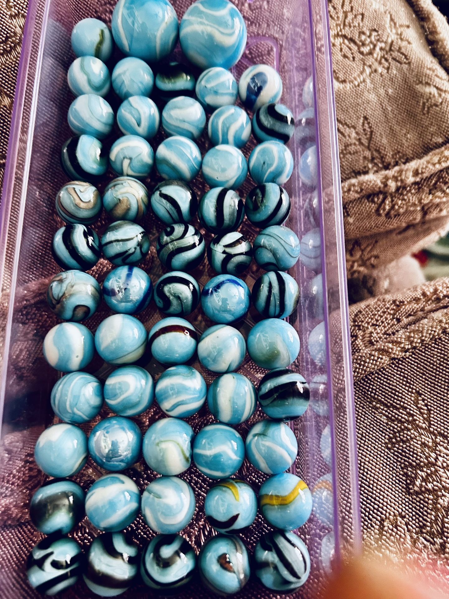 55 Aqua Blue Marbles & 2 Shooters