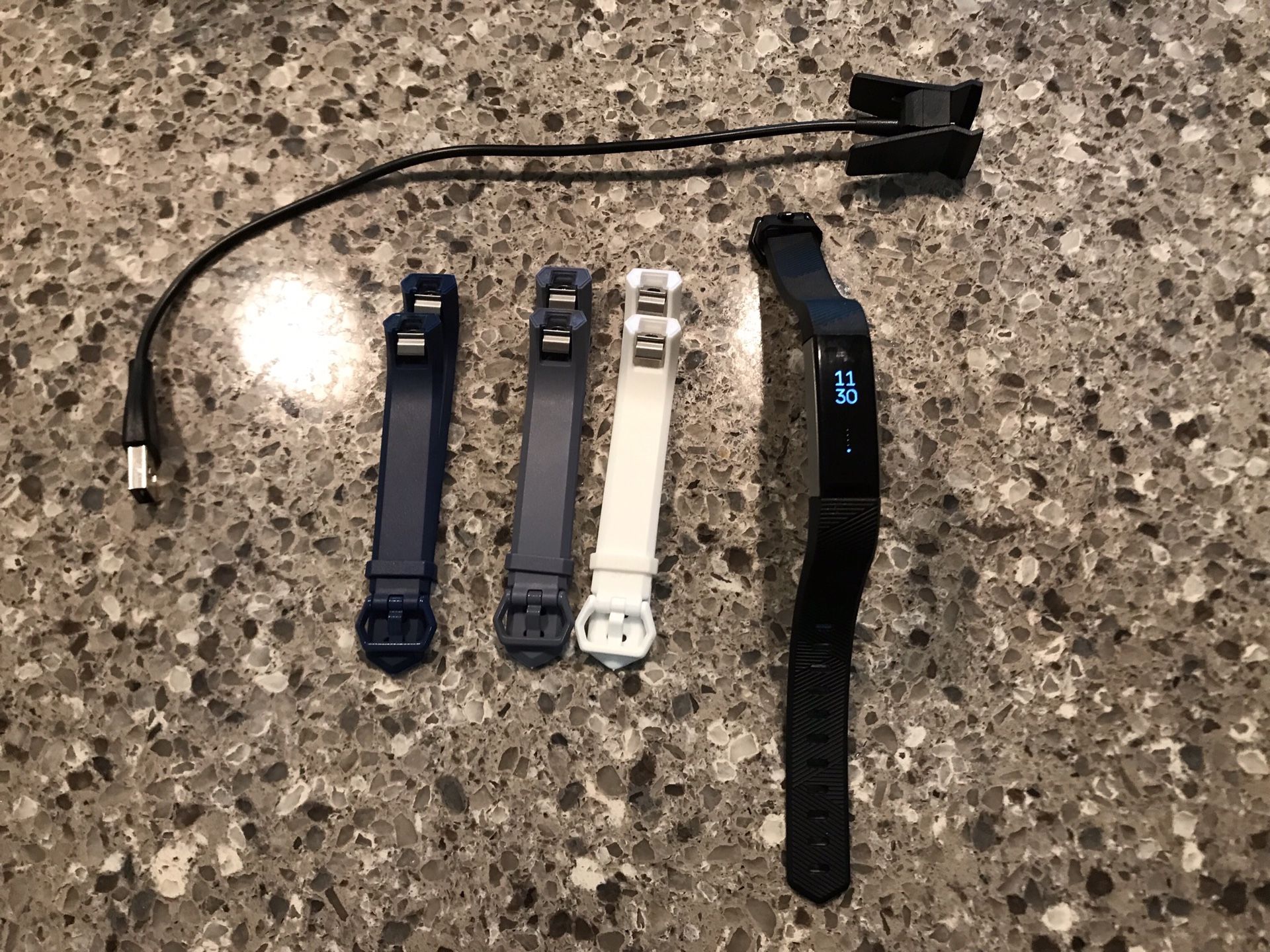 Fitbit Alta with charger and extra bands