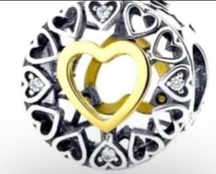 Gorgeous beautiful Heart  gold and silver Charm
