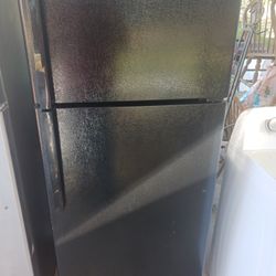 Black Refrigerator And Stove 