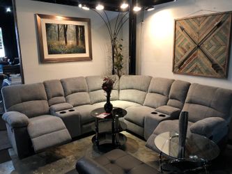 Grey Family Size Reclining Sectionals with Cupholders