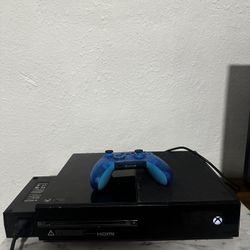 Xbox One With Controller And Games On It 
