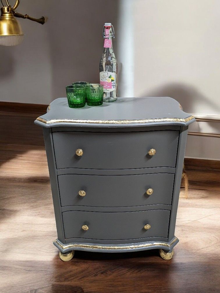 Wood 3 Drawer Gray Side Dresser With Gold Leaf Accents