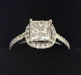 Diamond Ring, 1.01 Carat Princess Cut, Grade SI-1 (E) Color Natural Diamond. Asking $2,300.00.