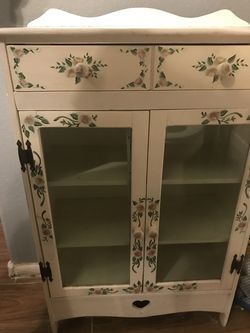 cute small white cabinet