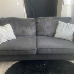 Grey fold-out sofa