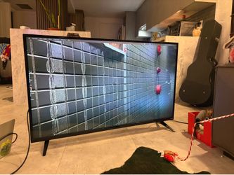 VIZIO 48” Full HD Smart TV (Model E48-C2).