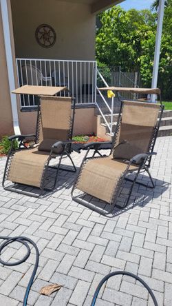 Gravity chairs.  Great for beach or patio.
