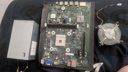Amd 4 Motherboard with 180w power supply and a CPU cooler