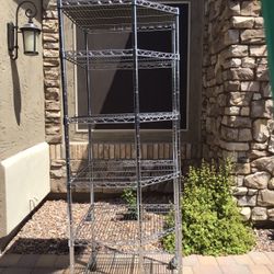 6 shelf stainless steel corner shelving unit. 