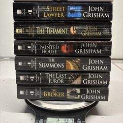 7 John Grisham Softcover Books