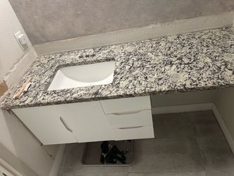 Bathroom vanity cabinet marble countertop and backsplash