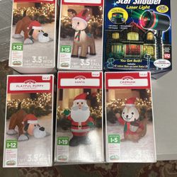 Christmas Blow Ups And Laser Light 