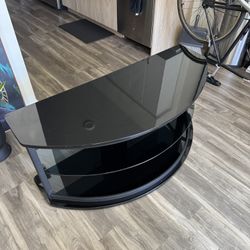 🔥 Sleek Black Glass TV Stand – Gently Used & Stylish! 🔥