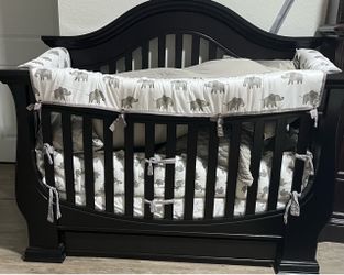 Expresso  Wood Crib with with two drawers. Convers into a bed, rail included, no pads. Only crib & rail. $200.