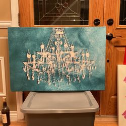 A canvas painting of a chandelier