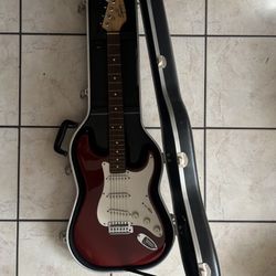 red squier stratocaster by fender electric guitar + amp