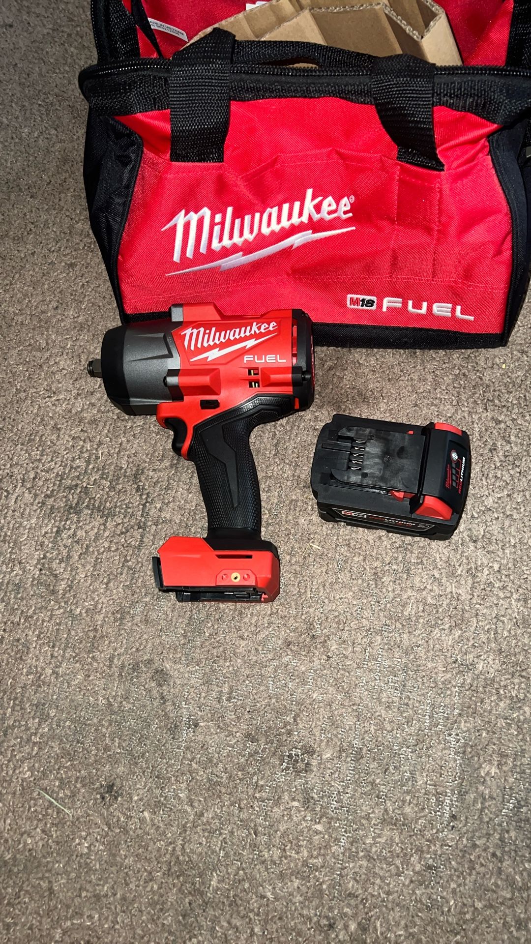 Milwaukee M18 Fuel Brushless 1/2” Impact Wrench  5.Ah Battery and Charger Like New 