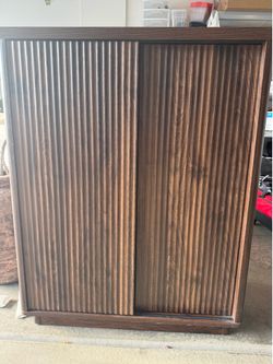 Dark wood shoe cabinet