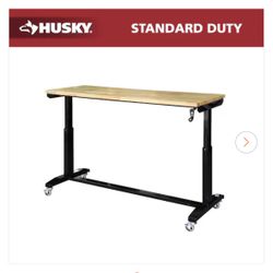 BRAND NEW IN BOX Husky 62 in. W x 24 in. D Adjustable Height Black Workbench Table with Solid Wood Top