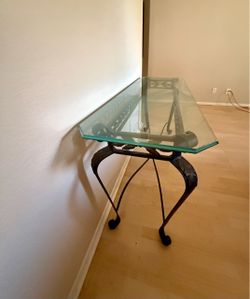 Antique wrought iron table with glass top