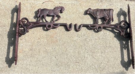 Pair of Atlanta Stove Works cast iron wall hangers/brackets ~ trotting horse and cow