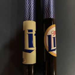 2 Collectible Cue Sticks
