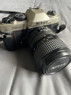 Nikon FM-10 35mm Camera And 35-70mm Lens