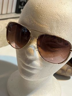 GB sunglasses bling gold trim and a coach case