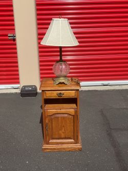 Antique nightstand and antique lamp