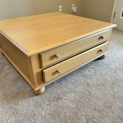 Ethan Allen square coffee table with 4 drawers.