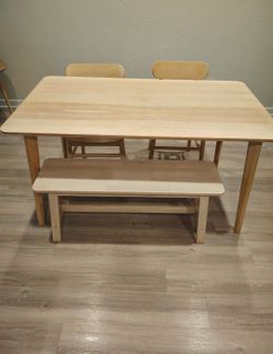 Nice table, chairs, and benches