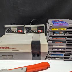 Vintage Nintendo NES Console Bundle with 2 Controllers, Zapper Guns, 10 Games - Missing AV Cables


