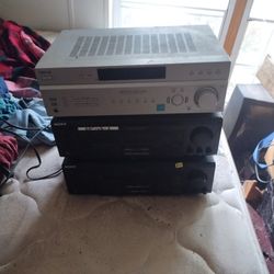 Two Black Sony Receivers And One Silver One