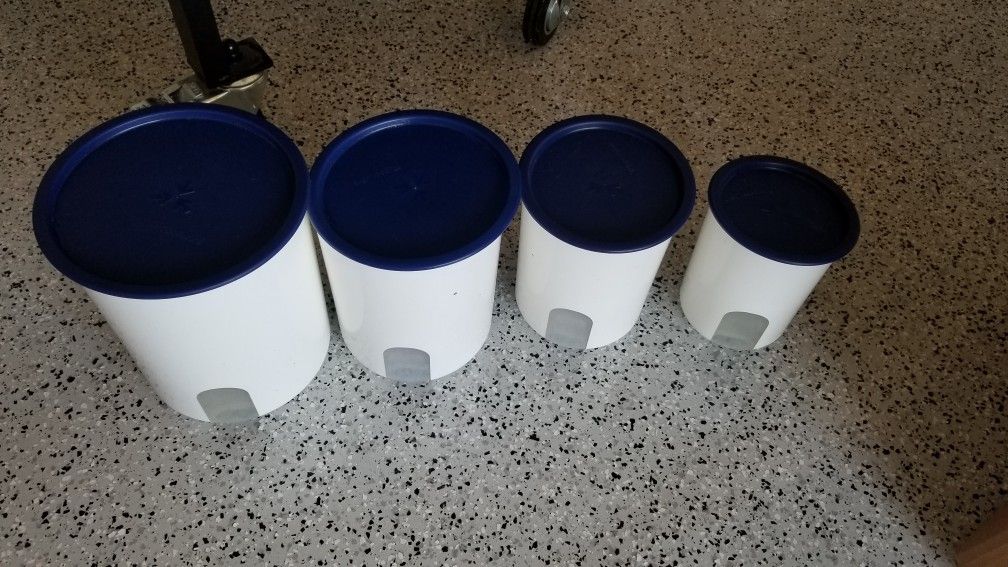 4 TUPPERWARE PLASTIC CANISTERS 