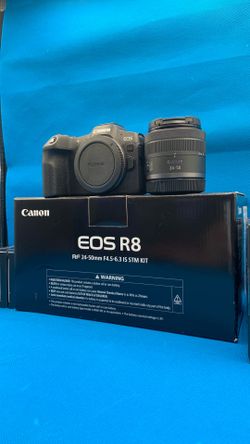Canon R8 with 24-50mm lens.  Open box